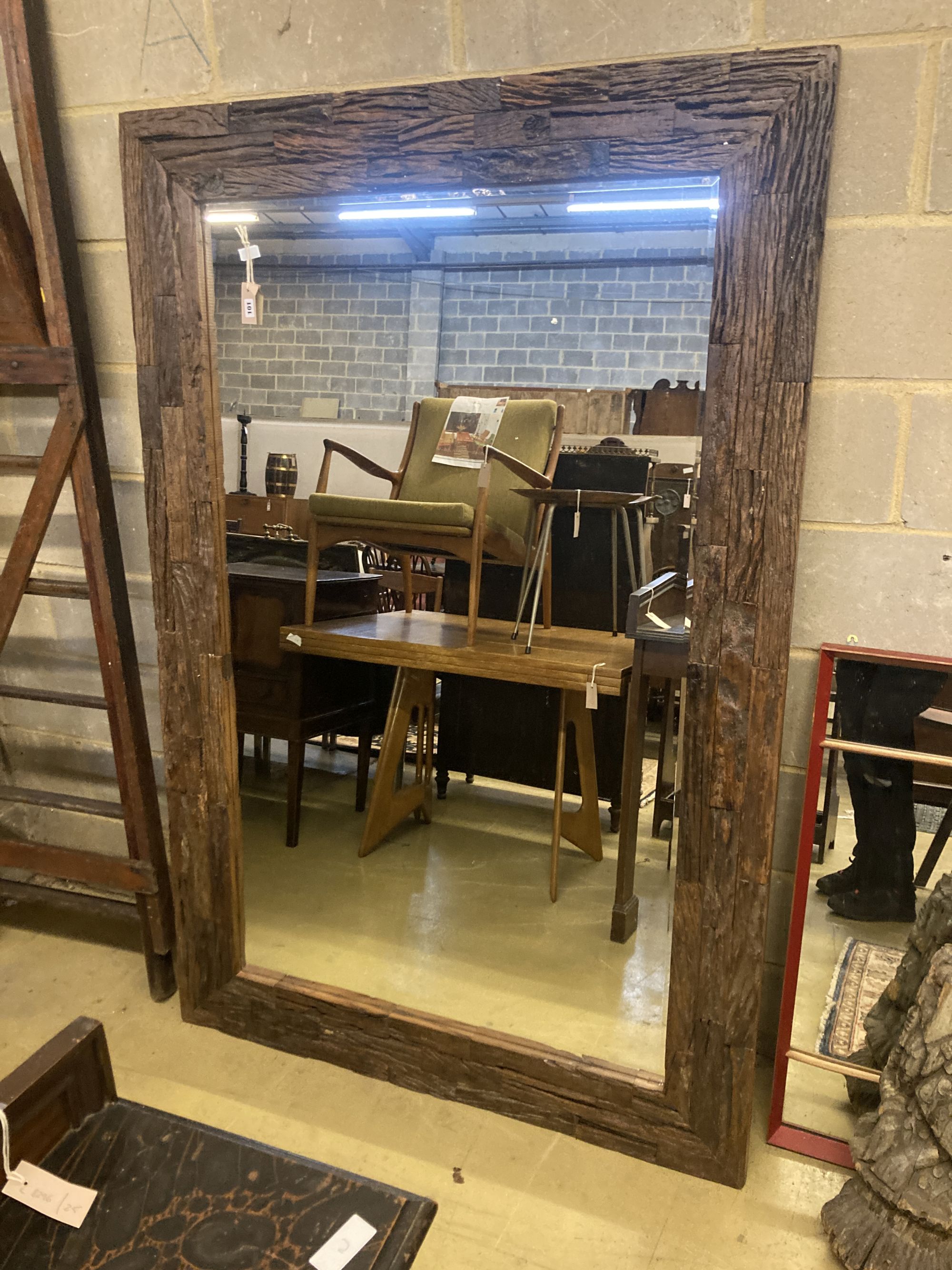 A large rectangular reclaimed wood wall mirror, width 122cm, depth 184cm